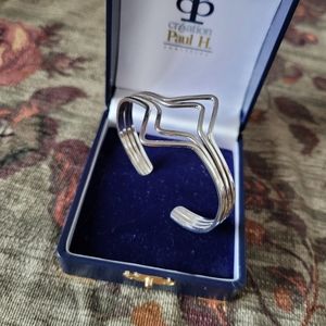 Vintage sterling silver handcrafted modernist cuff bracelet. Marked. Unisex.